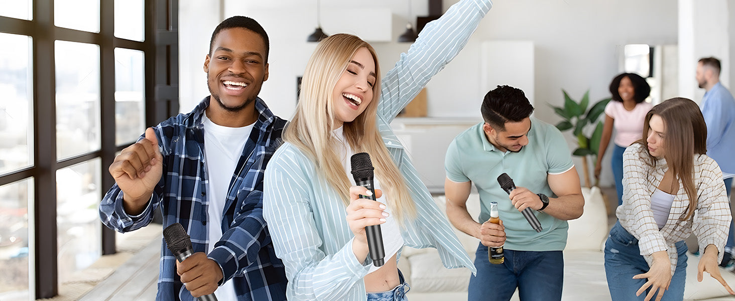 A group of people use the K60 wireless microphone to heat up the party indoors